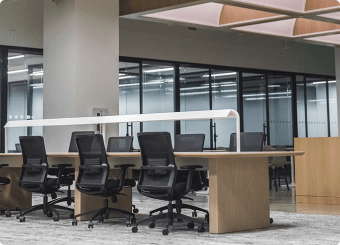 An empty open-plan DigitalHiring office with rows of desks